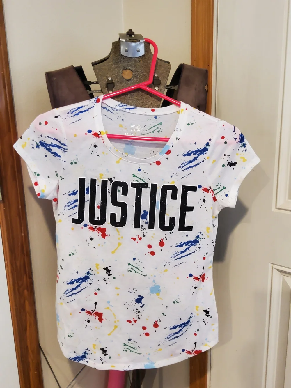 Justice White Graphic Tee with Multicolor Paint Splatter